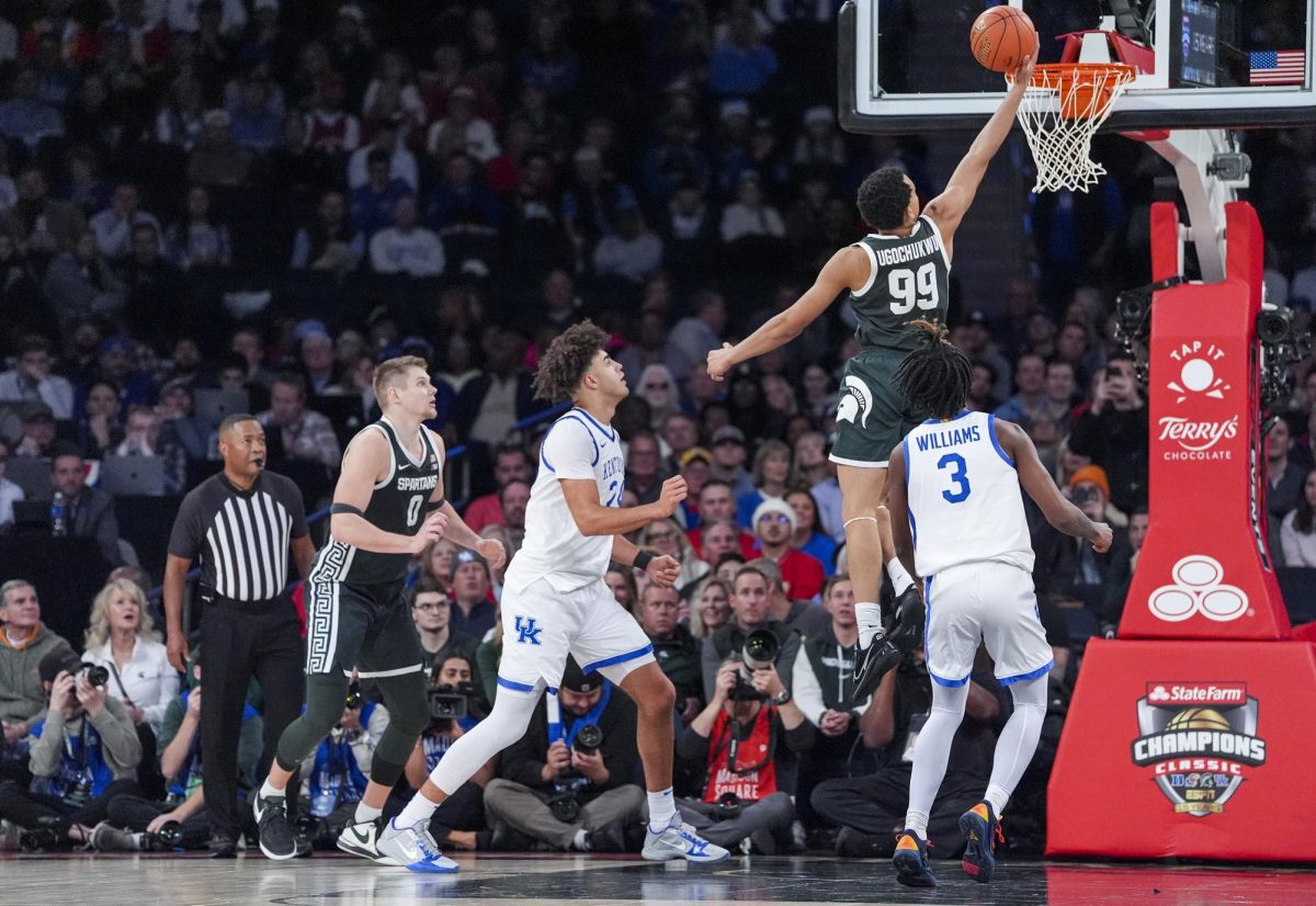 Michigan State Spartans guard Divine Ugochukwu scores a layup during the basketball game against Michigan State on Tuesday, Nov. 18, 2025, at Madison Square Garden in New York City. Michigan State won 83-66. Photo by Christian Kantosky | Photo Editor