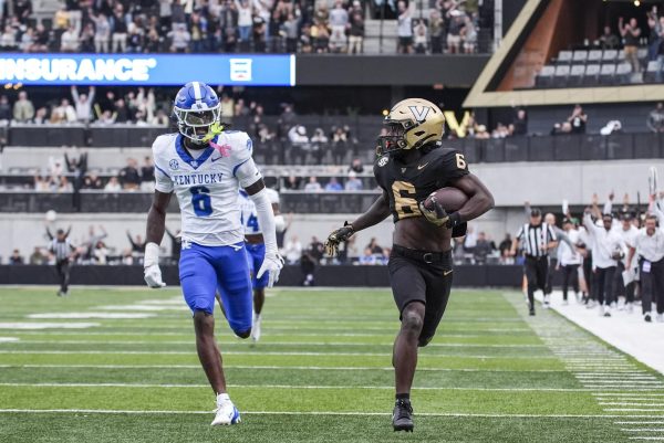 Kentucky Wildcats defensive back Jq Hardaway (6) chases Vanderbilt Commodores wide receiver Tre Richardson (6) into the end zone during the football game against Vanderbilt on Saturday, Nov. 22, 2025, at FirstBank Stadium in Nashville, Tenn. Photo by Christian Kantosky | Photo Editor