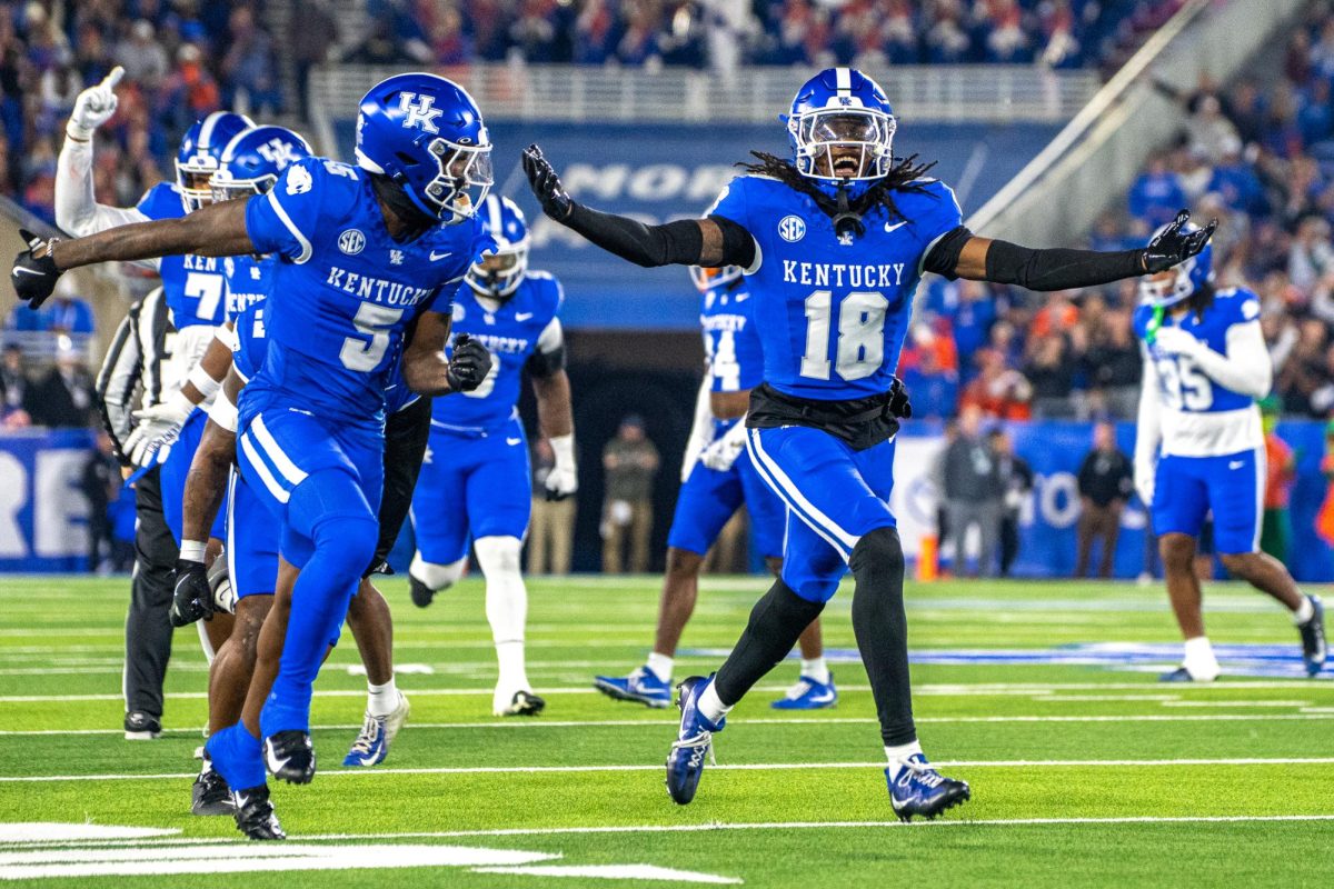 Kentucky Wildcats defensive back Cam Dooley (18) celebrates after intercepting a pass during the football game against Florida on Saturday, Nov. 8, 2025, at Kroger Field in Lexington, Ky. Photo by Will Luckett | Staff