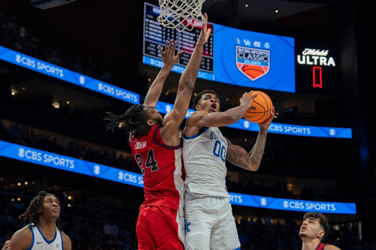 University of Kentucky Guard Otega Oweh attempts a layup as UK beats St. John's 78-66 at the CBS Sports Classic in State Farm Arena, Atlanta, Ga. Photo taken by Peyton Tindall | Staff