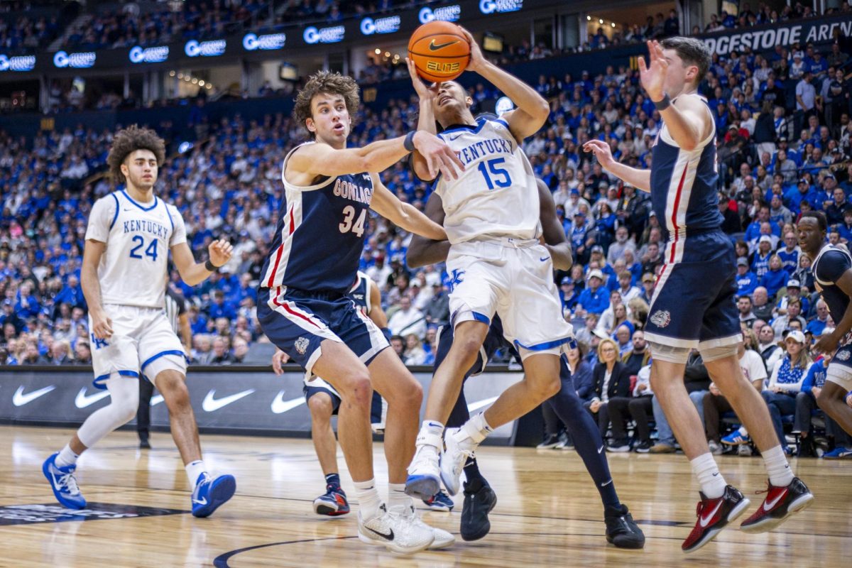 Gonzaga Bulldogs forward Braden Huff fouls Kentucky Wildcats guard Jaland Lowe during the basketball game against Gonzaga on Friday, Dec. 5, 2025, at Bridgestone Arena in Nashville, Tenn. Gonzaga won 94-59. Photo by Christian Kantosky | Photo Editor