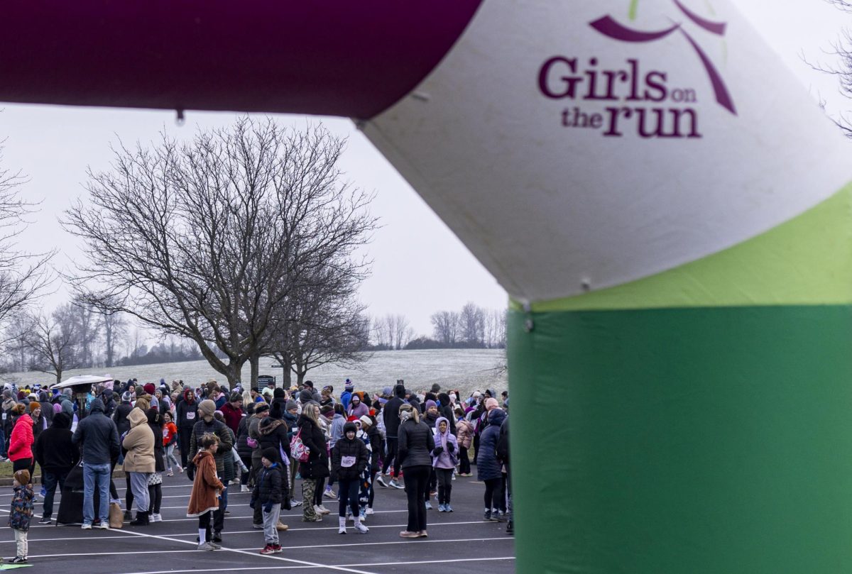 Runners prepare to race at the starting gate during the Girls on the Run event on Saturday, Dec. 6, 2025, at Keeneland in Lexington, Ky. Photo by Christian Kantosky | Photo Editor