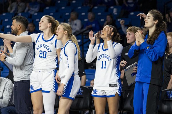 The Kentucky bench cheers during the game against Central Michigan on Sunday, Dec. 7, 2025, at the Historic Memorial Coliseum in Lexington, Ky. Photo by Kate Bonafede | Staff
