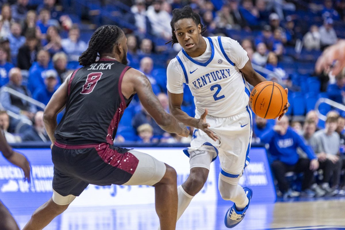 Kentucky Wildcats guard Jasper Johnson dribbles past North Carolina Central Eagles guard Jae Slack during the basketball game against North Carolina Central on Tuesday, Dec. 9, 2025, at Rupp Arena in Lexington, Ky. Kentucky won 103-67. Photo by Christian Kantosky | Photo Editor