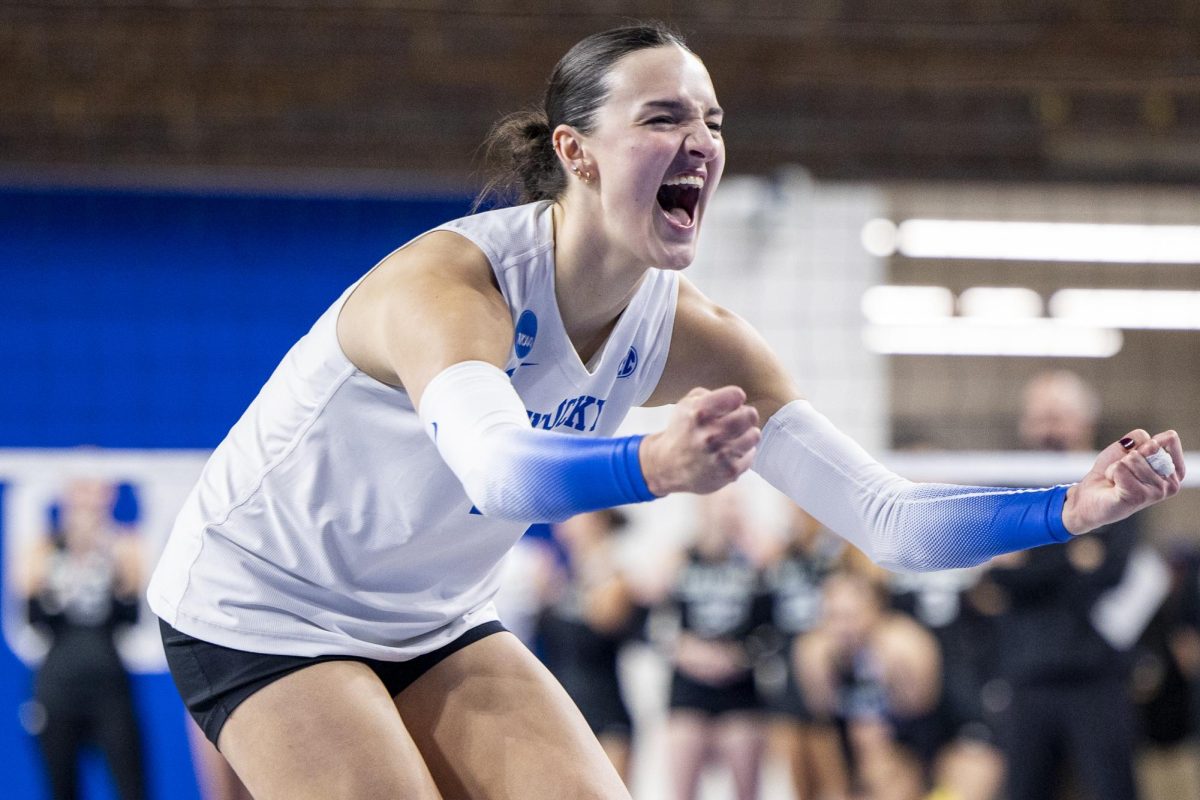 Kentucky Wildcats outside hitter Eva Hudson celebrates after scoring a point during the NCAA Sweet 16 volleyball match against Cal Poly on Thursday, Dec. 11, 2025, at Historic Memorial Coliseum in Lexington, Ky. Kentucky won 3-0. Photo by Christian Kantosky | Photo Editor