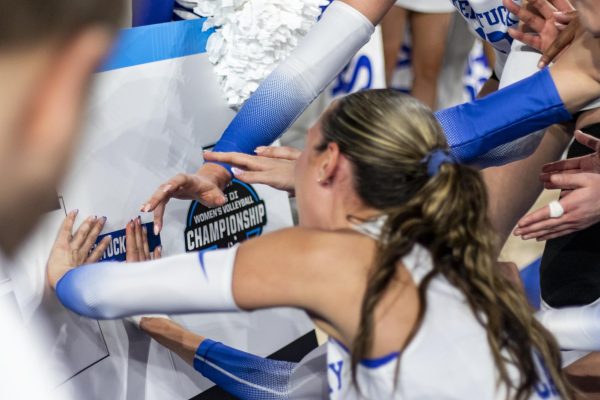 Kentucky Wildcats middle blocker Lizzie Carr puts the sticker onto the wrong slot after the NCAA Sweet 16 volleyball match against Cal Poly on Thursday, Dec. 11, 2025, at Historic Memorial Coliseum in Lexington, Ky. Kentucky won 3-0. Photo by Christian Kantosky | Photo Editor