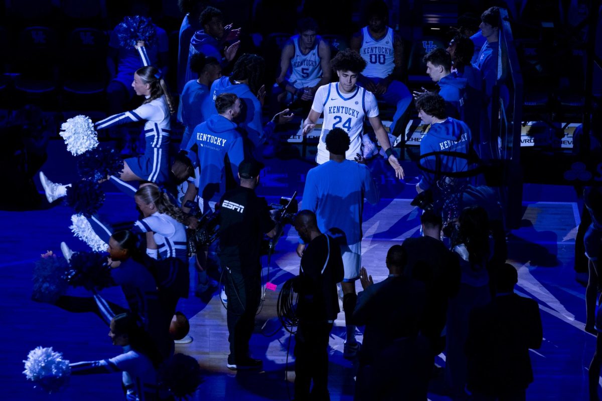 Kentucky Wildcats center Malachi Moreno high fives teammates before the basketball game against Indiana on Saturday, Dec. 13, 2025, at Rupp Arena in Lexington, Ky. Kentucky won 72-60. Photo by Christian Kantosky | Photo Editor