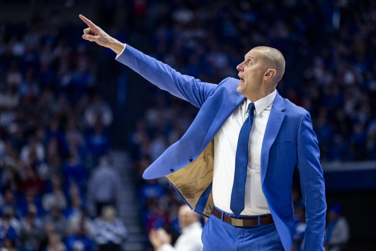 Kentucky Wildcats head coach Mark Pope directs players during the basketball game against Indiana on Saturday, Dec. 13, 2025, at Rupp Arena in Lexington, Ky. Kentucky won 72-60. Photo by Christian Kantosky | Photo Editor