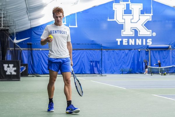 Nicolas Arseneault, a freshman tennis player at the University of Kentucky, prepares to serve a tennis ball on Wednesday, Dec. 10, 2025 at the Hilary J. Boone Tennis Center in Lexington, Ky. Photo by Olivia White | Staff