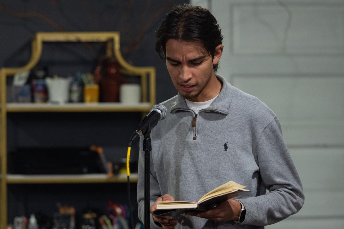 Alejandro Diaz reads his poem at La Voz on Thursday, Nov. 20, 2025, at Levee Collective in Lexington, Ky. Photo by Brooke Johnson | Staff