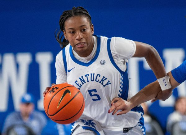 Kentucky guard Tonie Morgan (5) takes the ball upcourt during the Kentucky vs Hofstra women’s basketball game on Dec. 28, 2025, in Memorial Coliseum in Lexington, Ky. Photo by Jack Bates | Staff