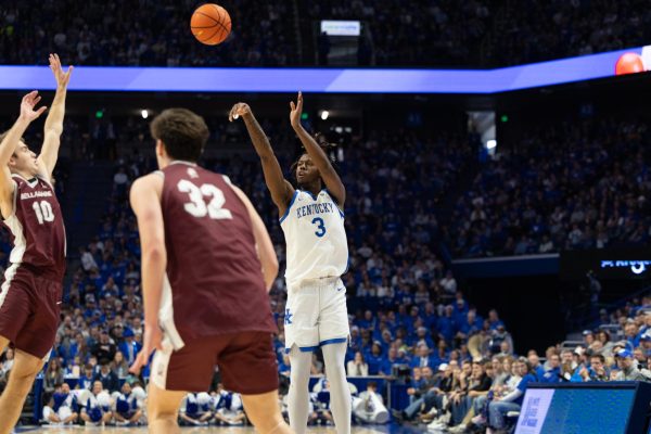 Kentucky guard Kam Williams (3) shoots a three during the mens basketball game against Bellarmine on Tuesday, Dec. 23, 2025, at Rupp Arena in Lexington, Ky. Kentucky won 99-85. Photo by Kate Bonafede | Staff