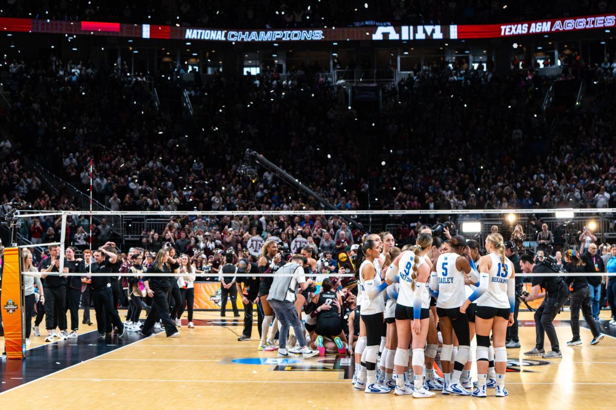 Kentucky Wildcats huddle after the loss in the NCAA D1 Women’s Volleyball Championship game against Texas A&M on Sunday, Dec. 21, 2025, at T-Mobile Center in Kansas City, Mo. Texas A&M won 3-0. Photo by Will Luckett | Photo Manager