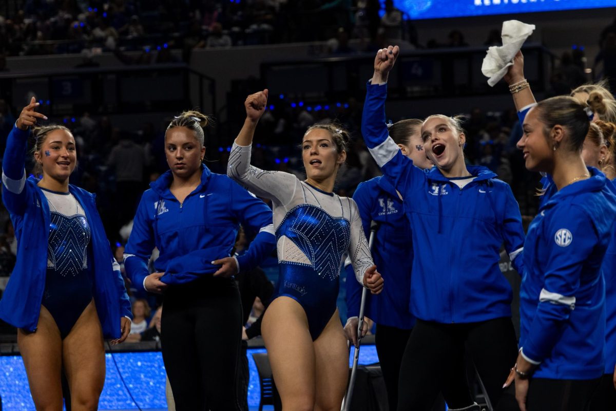 University of Kentucky gymnasts dance to the music to keep warm before they do their routines in a match against the Arizona State University on Friday, Jan. 16, 2026, at the Historic Memorial Coliseum in Lexington, Ky. Photo by Brooke Johnson | Photo Manager
