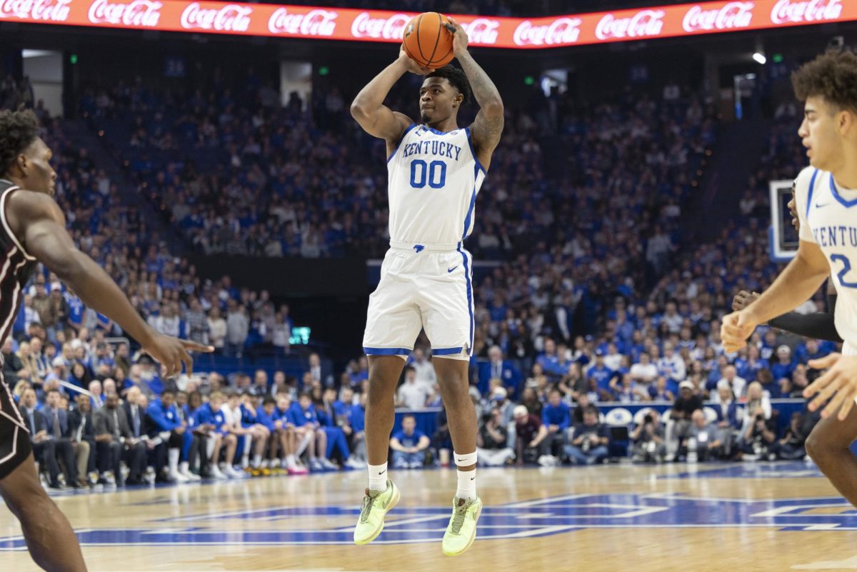 Kentucky guard Otega Oweh (00) shoots a three during the mens basketball game against Mississippi on Saturday, Jan, 10, 2026, at Rupp Arena in Lexington, Ky. Photo by Kate Bonafede | Staff
