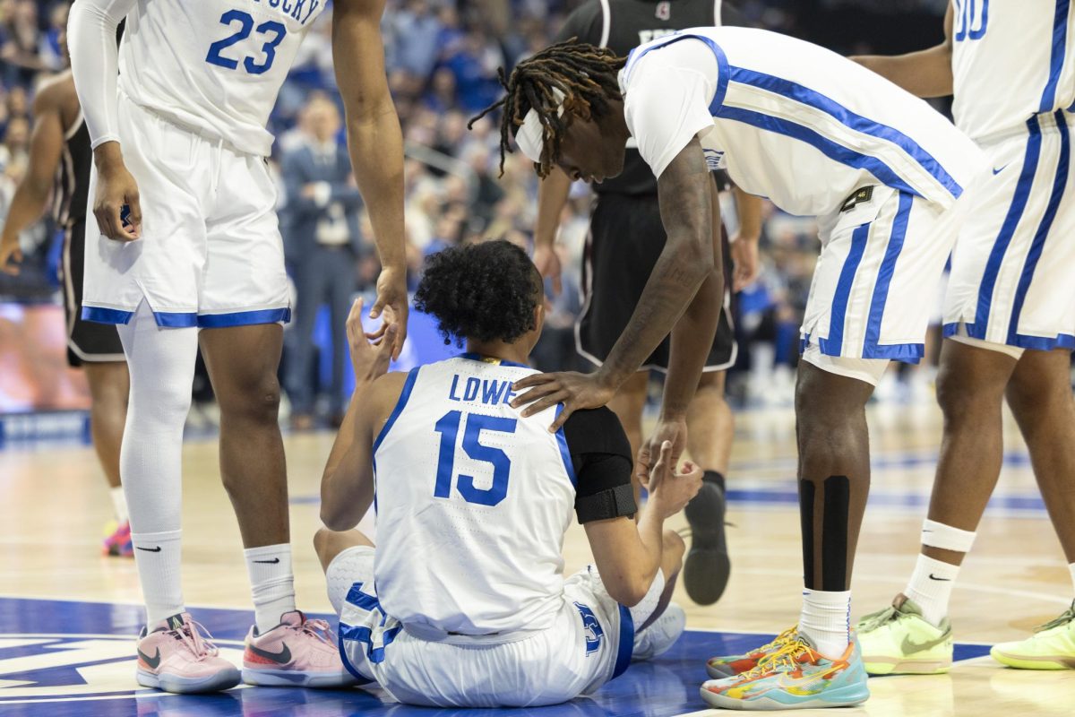 Kentucky guard Denzel Aberdeen helps guard Jaland Lowe up during the mens basketball game against Mississippi on Saturday, Jan, 10, 2026, at Rupp Arena in Lexington, Ky. Photo by Kate Bonafede | Staff
