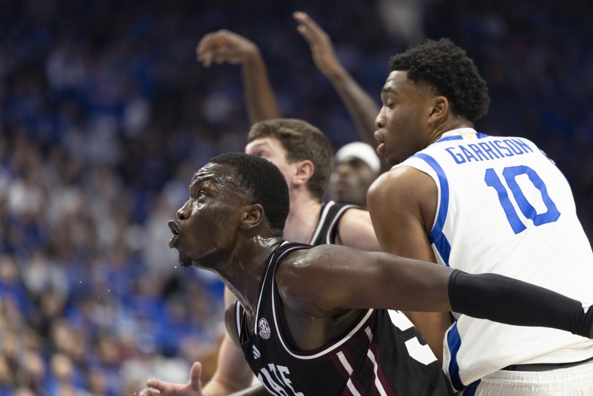 Mississippi forward Achor Achor (99)  blocks out Kentucky forward Brandon Garrison (10) during the mens basketball game against Mississippi on Saturday, Jan, 10, 2026, at Rupp Arena in Lexington, Ky. Photo by Kate Bonafede | Staff
