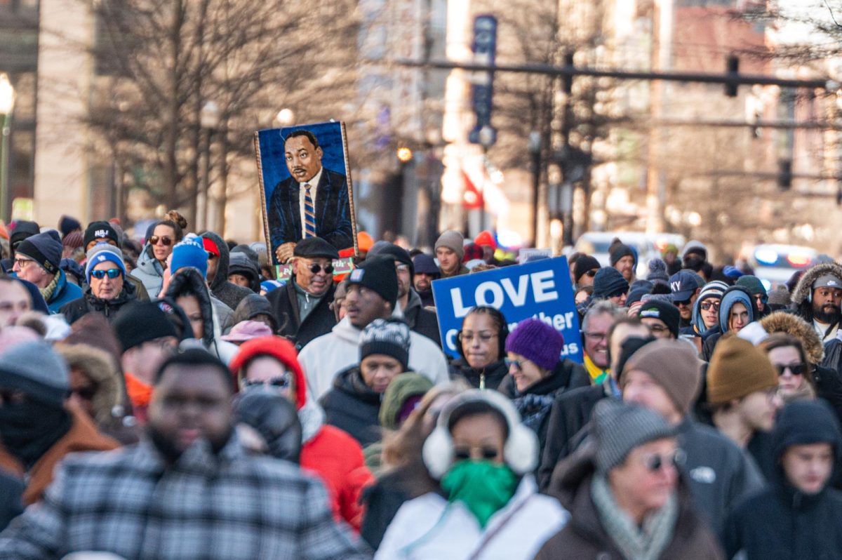 Supporters march during the Dr. Martin Luther King Jr. Freedom March on Monday Jan. 19, 2026, through downtown Lexington, Ky. Photo by Jack Bates | Staff
