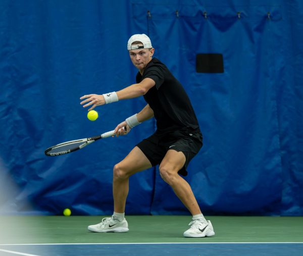 Kentucky junior Eli Stephenson hits the ball during the Kentucky vs Michigan State mens tennis match on Sunday, Jan. 18, 2025, at the Hilary J. Boone Tennis Complex in Lexington, Kentucky. Kentucky won 5-2. Photo by Brayden Finn | Staff
