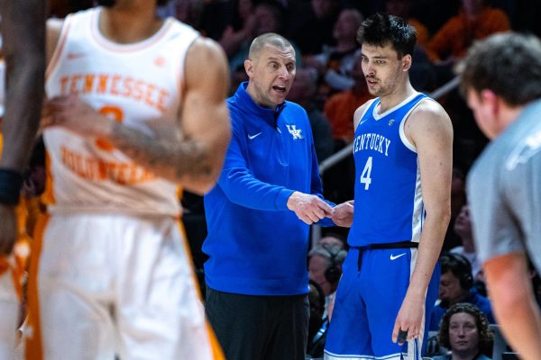 Kentucky Wildcats head coach Mark Pope talks with forward Andija Jelavić before a play during the basketball game against Tennessee on Saturday, Jan. 17, 2026, at Thompson-Boling Arena in Knoxville, Tn. Kentucky won 80-78. Photo by Will Luckett | Photo Manager
