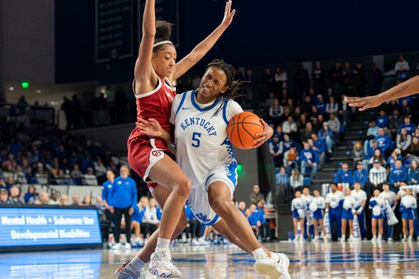 Kentucky Guard, number 5, Tonie Morgan attempts to drive in UK vs OKLA in Memorial Coliseum, Lexington, Ky on Sunday, Jan 11, 2026.  Photo taken by Peyton Tindall | Staff