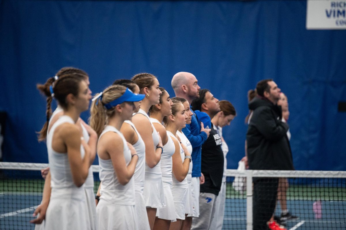 Kentucky team stands for the national anthem during the Kentucky vs EKU women's tennis match on Jan 17, 2026, in the Boone Center in Lexington, Ky. Photo by Jack Bates | Staff
