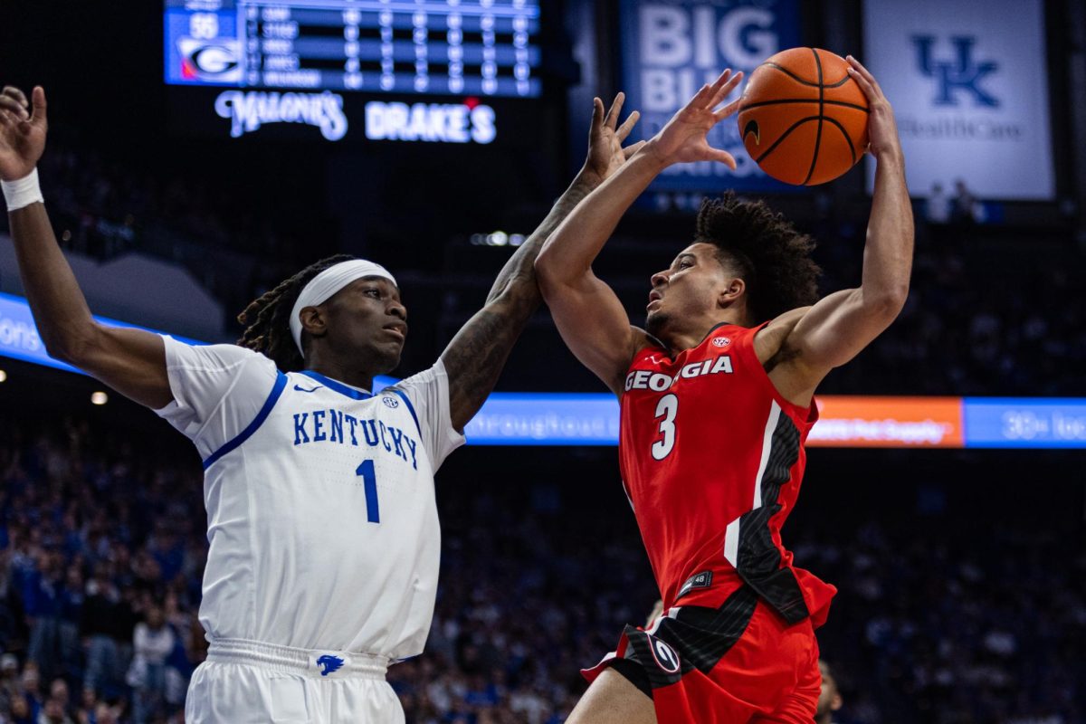 Kentucky guard Denzel Aberdeen (1) jumps to block Georgia guard Jordan Ross (3) jumpshot during the men’s basketball game against Georgia on Tuesday, Feb. 17, 2026, at Rupp Arena in Lexington, Ky. Kentucky lost 78-86. Photo by Cara Raiford | Staff
