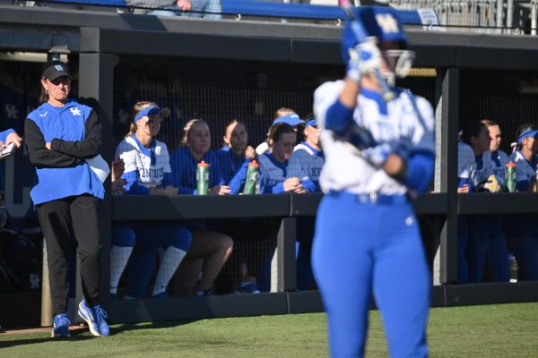 Kentucky head coach Rachel Lawson watches the softball game against Michigan State from the dugout on Friday, Feb. 27, 2026, at John Cropp Stadium in Lexington, Ky. Photo by Jack Bates | Kentucky Kernel