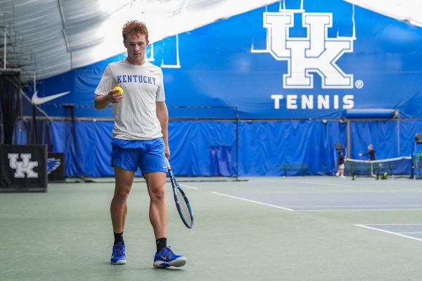 Nicolas Arseneault, a freshman tennis player at the University of Kentucky, prepares to serve a tennis ball on Wednesday, Dec. 10, 2025 at the Hilary J. Boone Tennis Center in Lexington, Ky. Photo by Olivia White | Kentucky Kernel