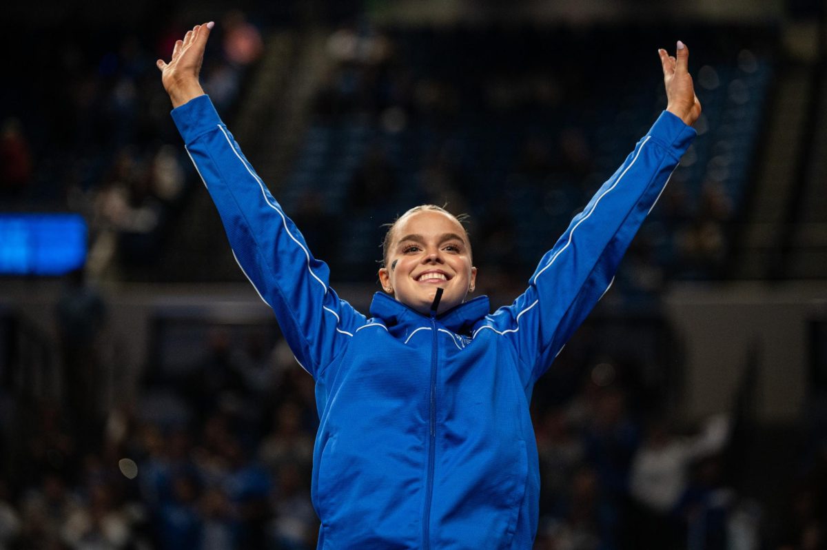 Kentucky junior Chesney Brose is honored for her balance beam performance during the Kentucky vs Missouri gymnastics meet on Feb 13, 2026, at Memorial Coliseum, in Lexington Ky. Missouri won 196.825-196.800. Photo by Jack Bates | Kentucky Kernel
