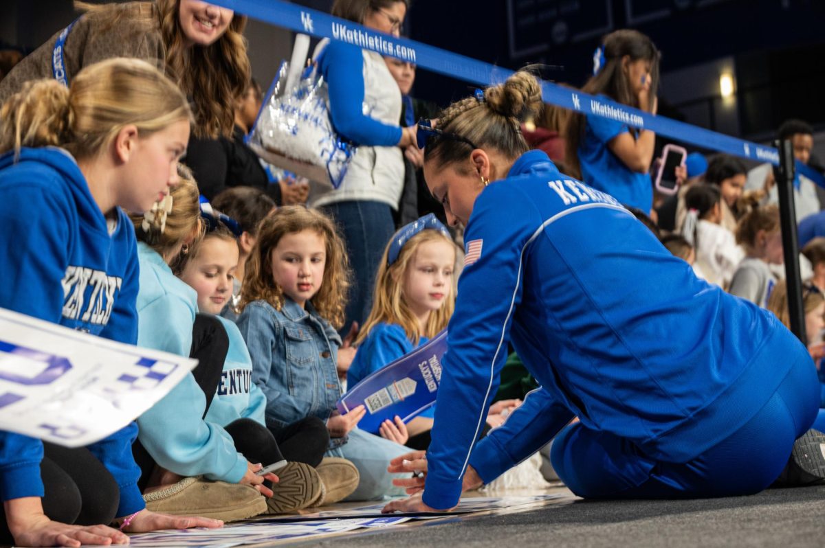 Young fans get their posters signed during the Kentucky vs Missouri gymnastics meet on Feb 13, 2026, at Memorial Coliseum, in Lexington Ky. Missouri won 196.825-196.800. Photo by Jack Bates | Kentucky Kernel

