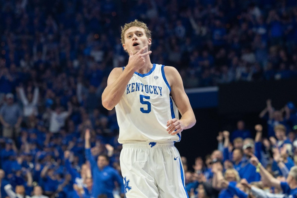 Kentucky guard Collin Chandler holds up three fingers after making a 3-pointer in the men's basketball game against Vanderbilt at Rupp Arena on Saturday, Feb. 28, 2026, in Lexington, Ky. Photo by Brooke Johnson | Kentucky Kernel
