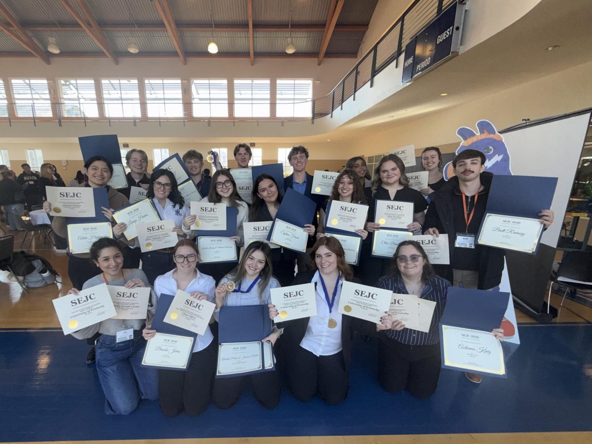 The Kentucky Kernel staff poses with its awards from the Southeast Journalism Conference Best of the South awards and On-Site competition awards on Saturday, Feb. 7, 2026, at the Georgia Highlands College Student Center Gym in Cartersville, Ga. Photo provided by Ryan Craig