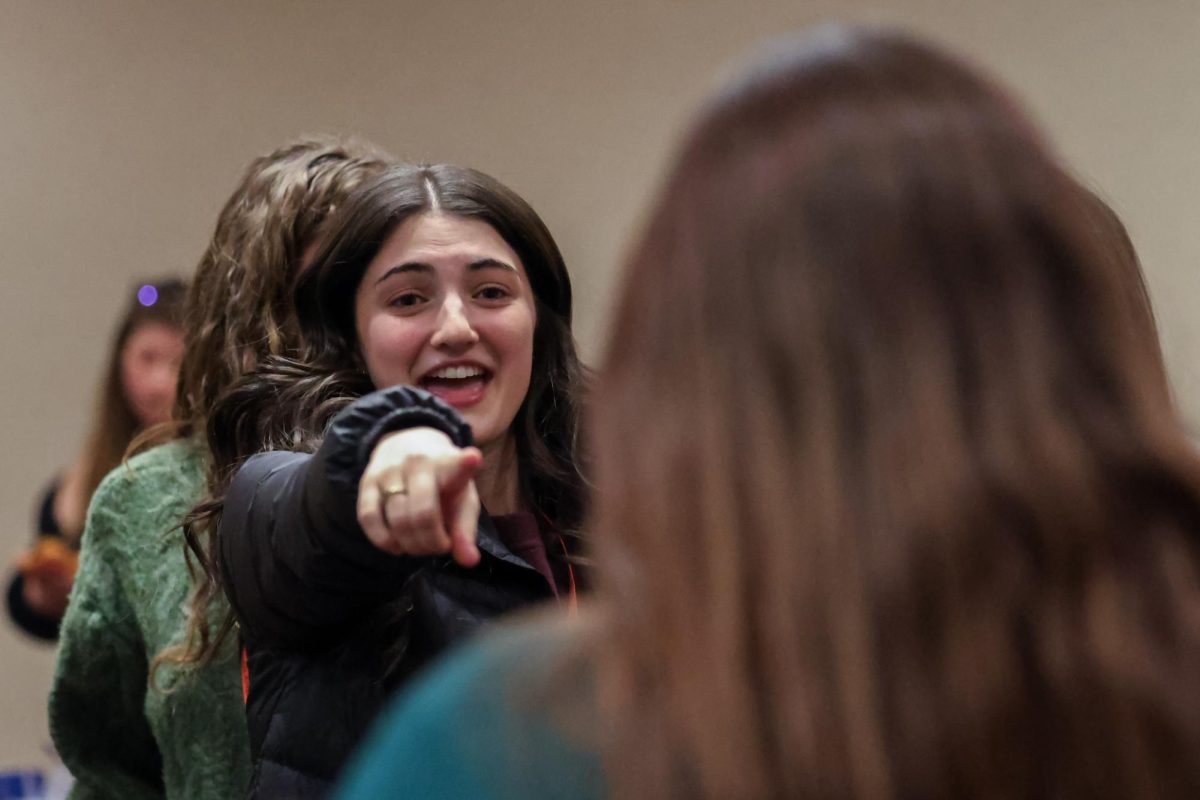 Belle Kelly, a sophomore Samford University student, points to her friend while singing “I’ll Be There For You” by Why Everyone Left, during the Southeastern Journalism Conference student mixer at Georgia Highlands College on Thursday, Feb. 5, 2026, in Cartersville, Ga. This photo won second place in the Feature Photography (Portraiture) category at the annual SEJC convention. Photo by Brooke Johnson | Kentucky Kernel