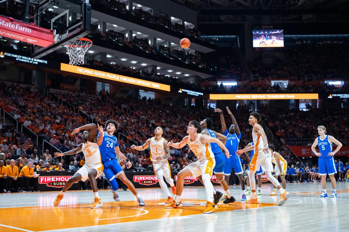 Kentucky Wildcats and Tennessee Volunteers crash to basket during free throws in the basketball game against Tennessee on Saturday, Jan. 17, 2026, at Thompson-Boling Arena in Knoxville, Tn. Kentucky won 80-78. Photo by Will Luckett | Photo Manager
