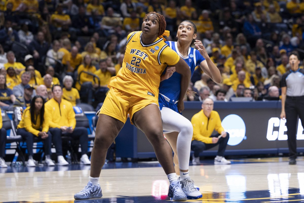 West Virginia forward Kierra Wheeler blocks out Kentucky forward Teonni Key during the NCAA women’s basketball tournament game against Kentucky on Monday, March, 23, 2026, at Hope Coliseum in Morgantown, W.Va. Photo by Kate Bonafede | Kentucky Kernel