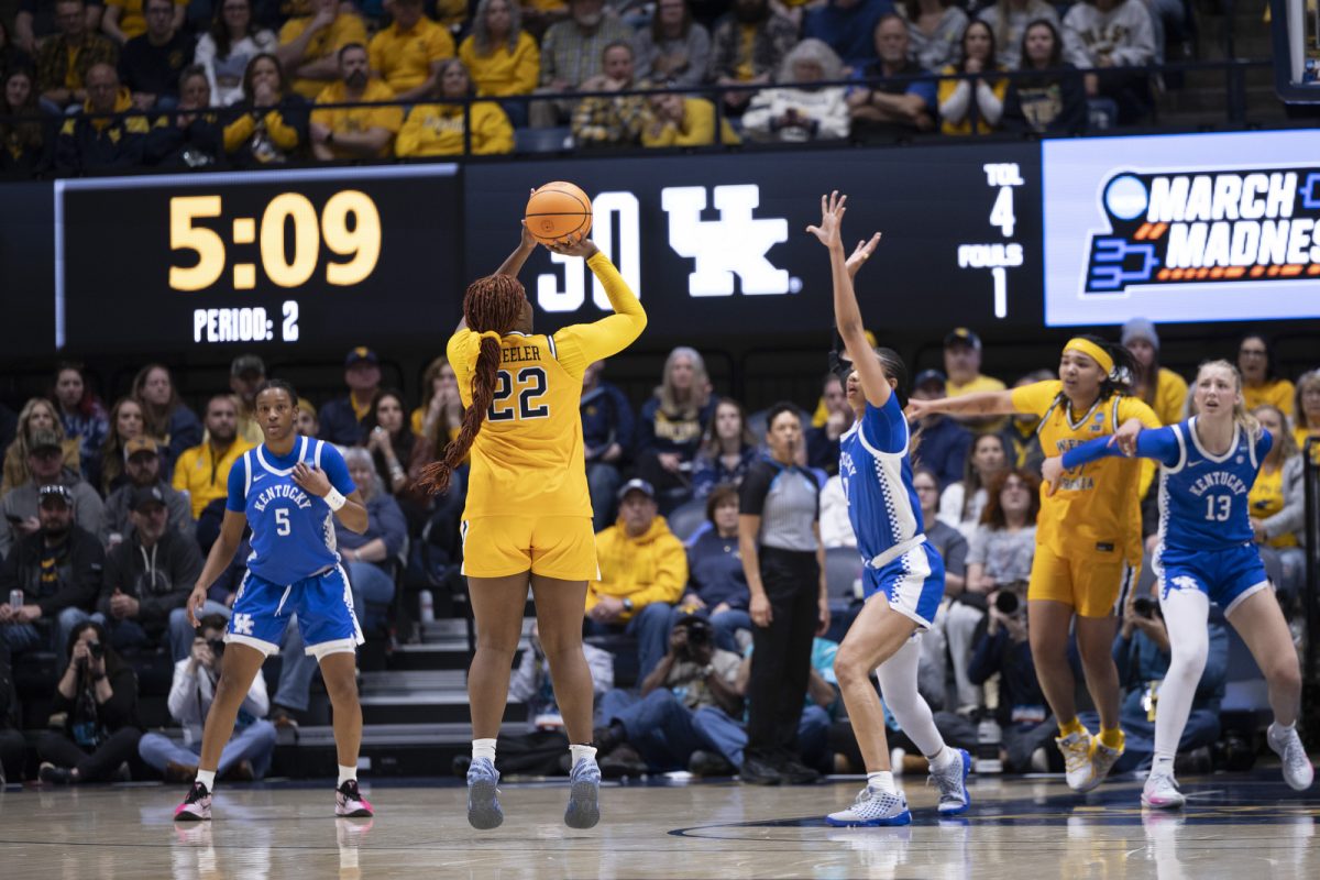 West Virginia forward Kierra Wheeler shoots a three during the NCAA women’s basketball tournament game against Kentucky on Monday, March, 23, 2026, at Hope Coliseum in Morgantown, W.Va. Photo by Kate Bonafede | Kentucky Kernel