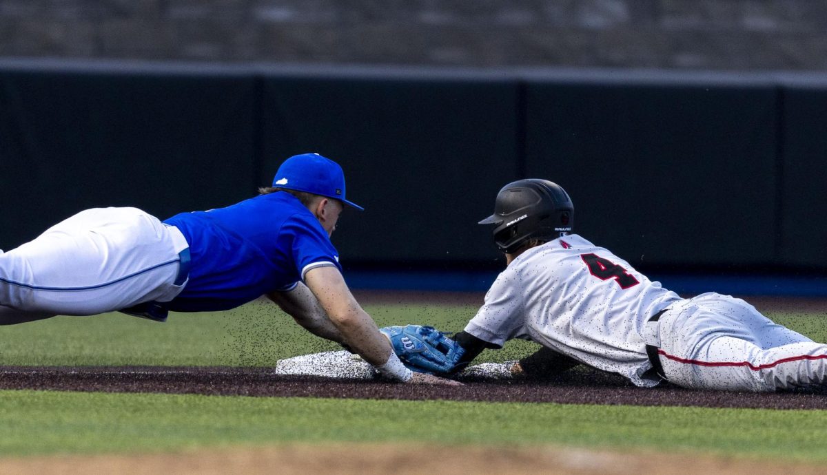 Kentucky infielder Caeden Cloud dives to tag Ball State outfielder Gavin Balius during the baseball game against Ball State on Tuesday, March 10, 2026, at Kentucky Proud Park in Lexington, Ky. Kentucky won 10-3. Photo by Vincenzo Ciaramitaro | Kentucky Kernel
