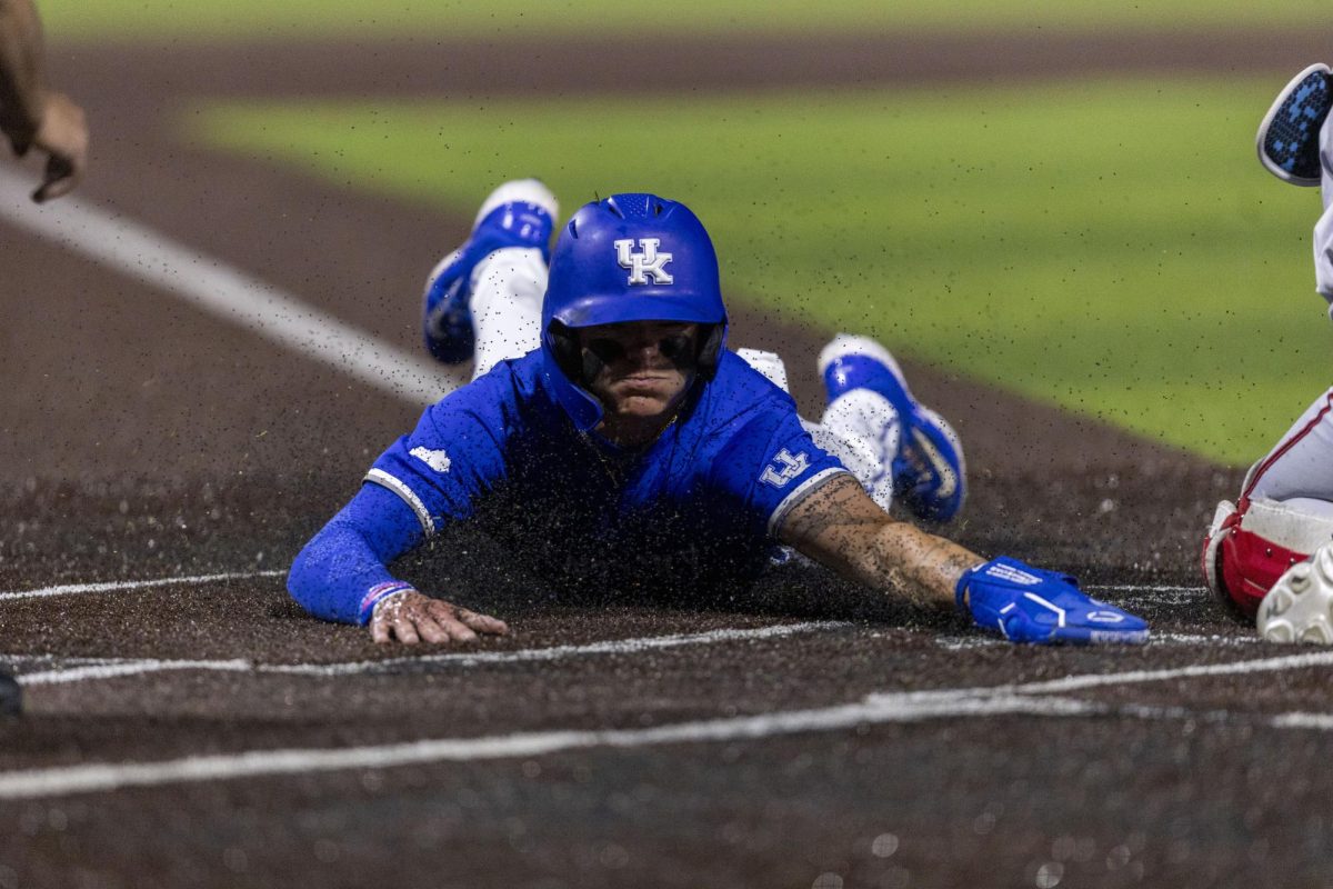 Kentucky infielder Luke Lawrence slides into home plate during a game against Ball State at Kentucky Proud Park on Tuesday, March 10, 2026, in Lexington, Ky. Kentucky won 10-3. Photo by Vincenzo Ciaramitaro | Kentucky Kernel
