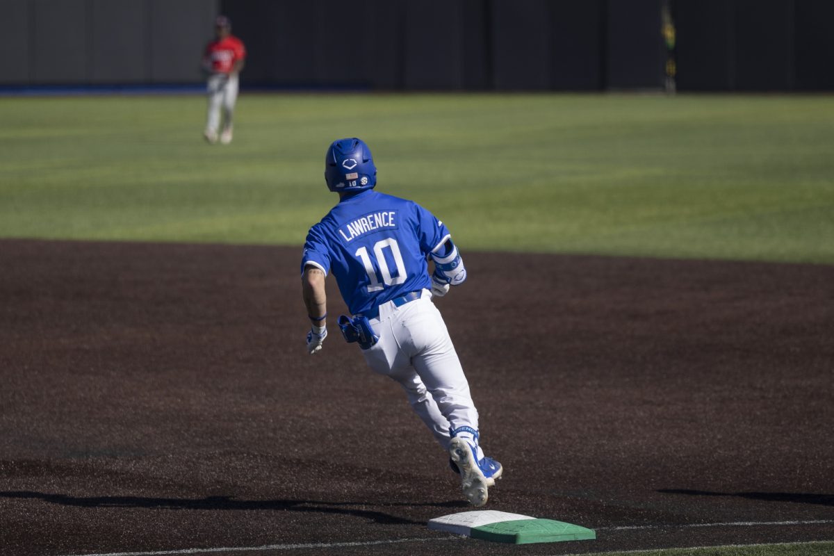 Kentucky infielder Luke Lawrence rounds first base during the baseball game against St. John’s on Saturday, Feb. 28, 2026, at Kentucky Proud Park in Lexington, Ky. Kentucky won 3-0. Photo by Kate Bonafede | Kentucky Kernel