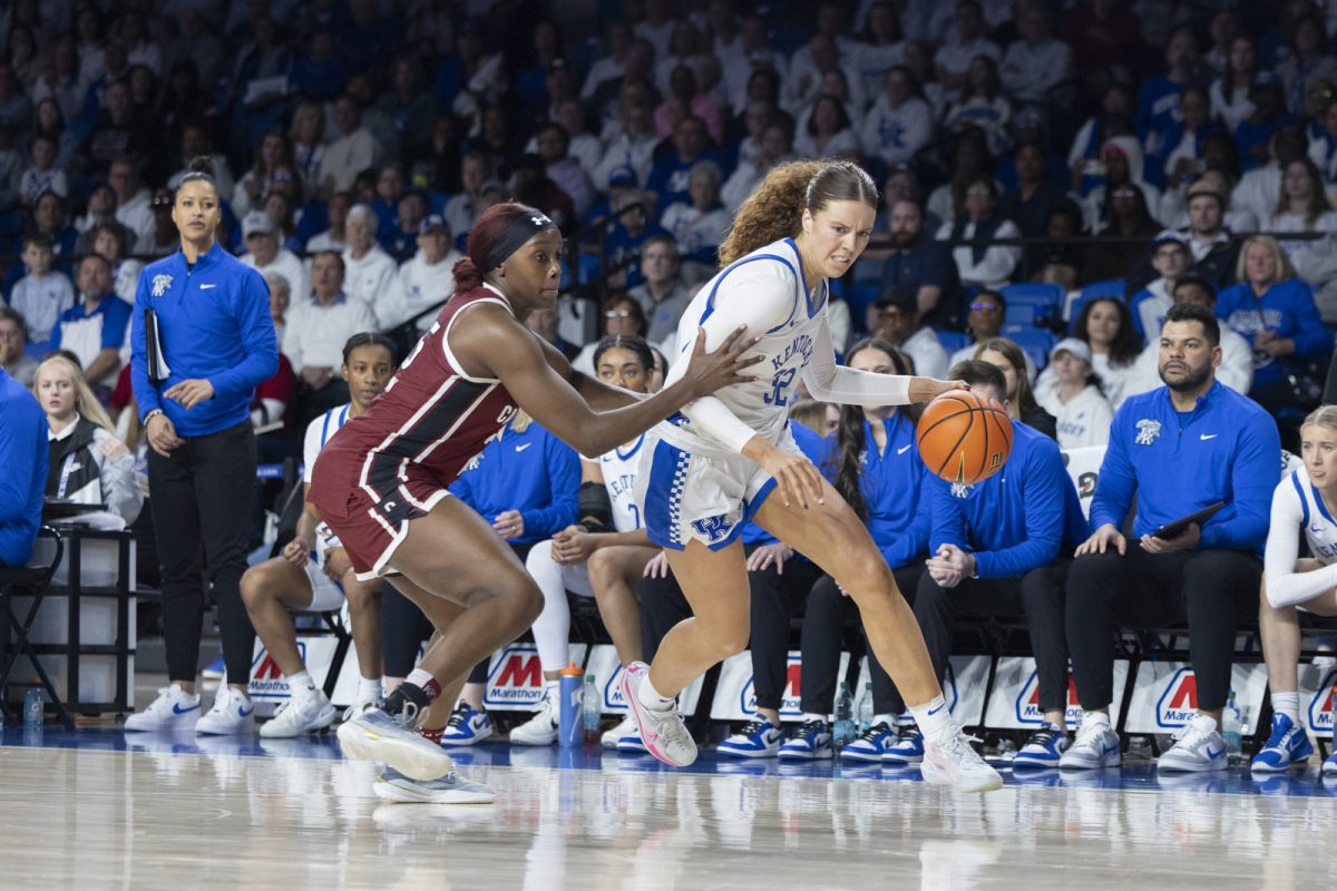 Kentucky forward Amelia Hassett runs past South Carolina guard Raven Johnson during the women’s basketball game against South Carolina on Sunday, March, 1, 2026, at Historic Memorial Coliseum in Lexington, Ky. South Carolina won 60-56. Photo by Kate Bonafede | Kentucky Kernel
