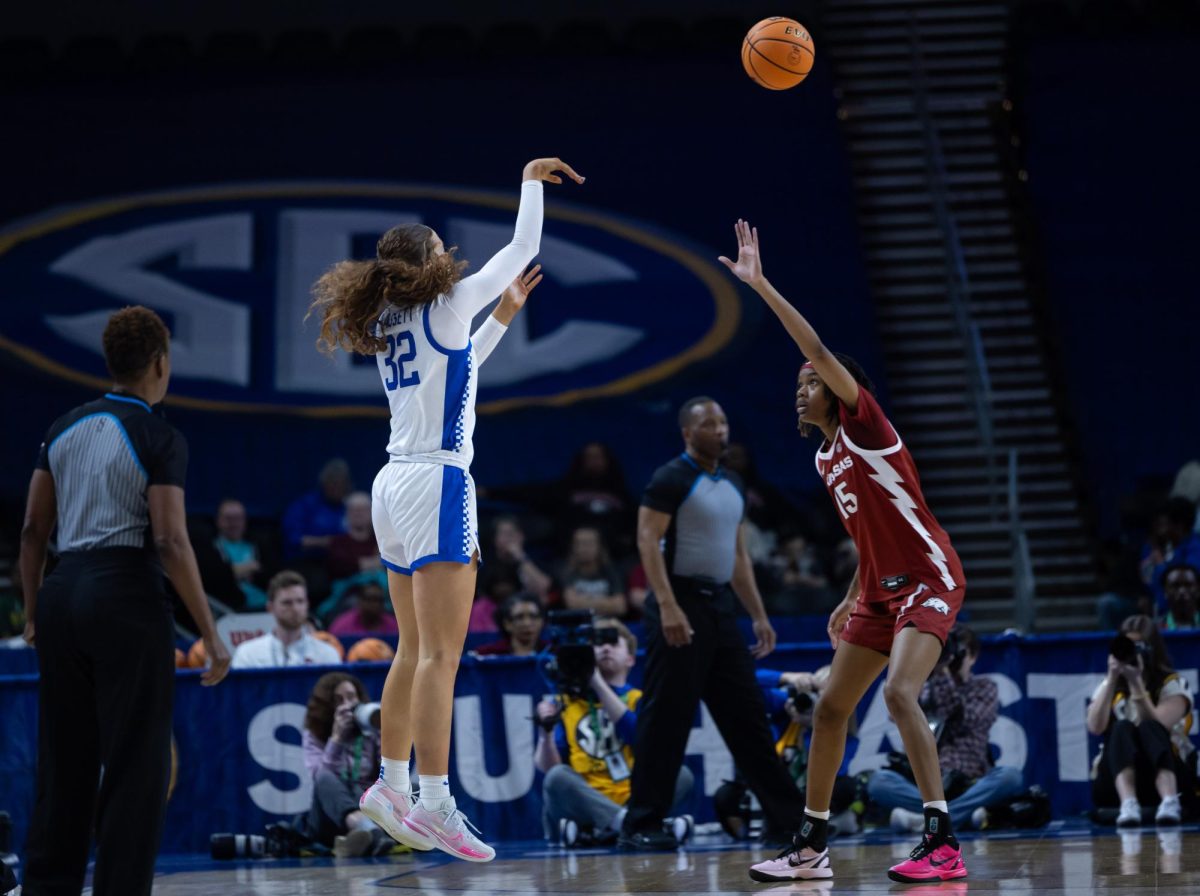 Kentucky forward Amelia Hassett shoots a three pointer over Arkansas guard Jada Bates during the NCAA Women’s SEC Basketball Tournament at Bon Secours Wellness Arena on Wednesday, March 4, 2026, in Greenville, S.C. Photo by Brooke Johnson | Kentucky Kernel
