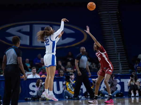 Kentucky forward Amelia Hassett shoots a three pointer over Arkansas guard Jada Bates during the NCAA Women’s SEC Basketball Tournament at Bon Secours Wellness Arena on Wednesday, March 4, 2026, in Greenville, S.C. Photo by Brooke Johnson | Kentucky Kernel
