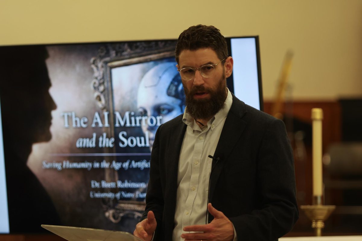 Dr. Brett. Robinson, associate professor at the University of Notre Dame, speaking at the Christianity in the Age of AI event at the Newman Center on the University of Kentucky’s campus on Tuesday, March 10, 2026 in Lexington, Ky. Photo by Holly Netzley | Kentucky Kernel
