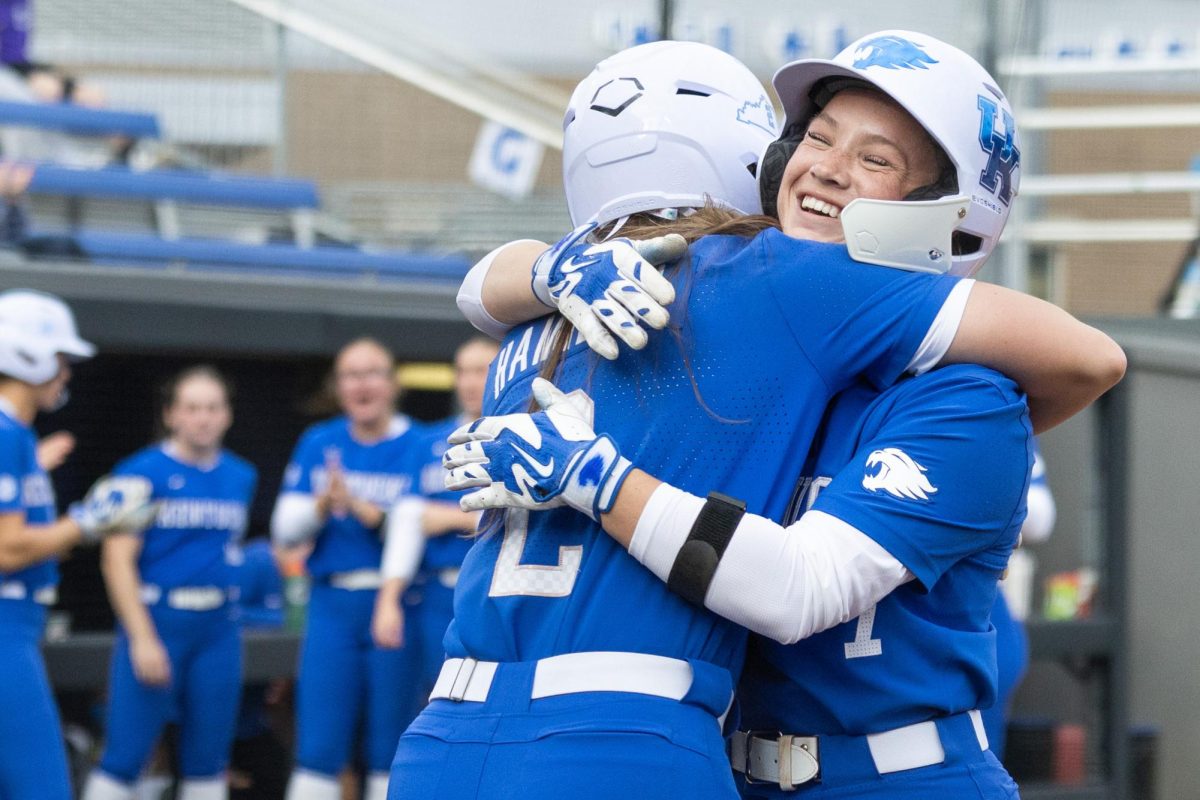 Kentucky first basemen Karissa Hamilton, left, hugs shortstop Maddy Clark during the softball game against Louisville on Wednesday, March 25, 2026, at John Cropp Stadium in Lexington, Ky. Kentucky lost 8-7. Photo by Scout Tarquinio | Kentucky Kernel
