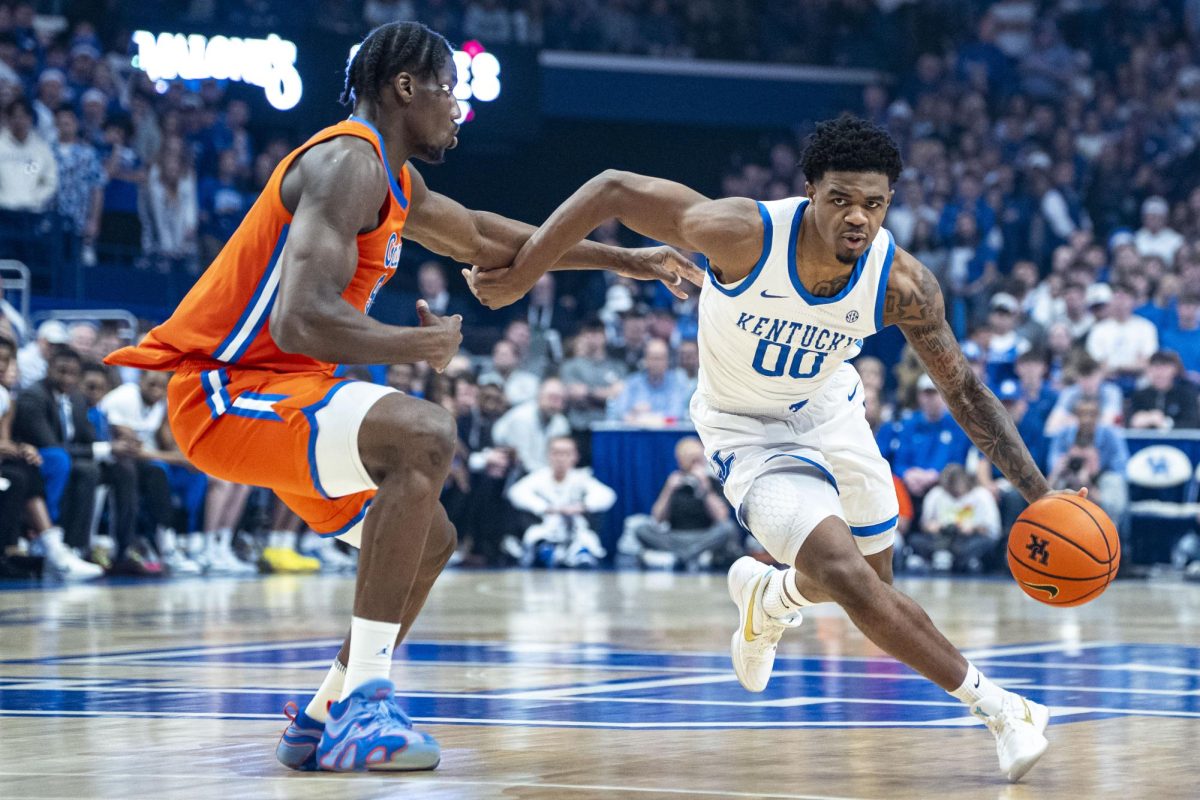 Kentucky guard Otega Oweh drives past Florida center Rueben Chinyelu during the men’s basketball game against Florida on Saturday, March 7, 2026, at Rupp Arena in Lexington, Ky. Photo by Will Luckett | Kentucky Kernel