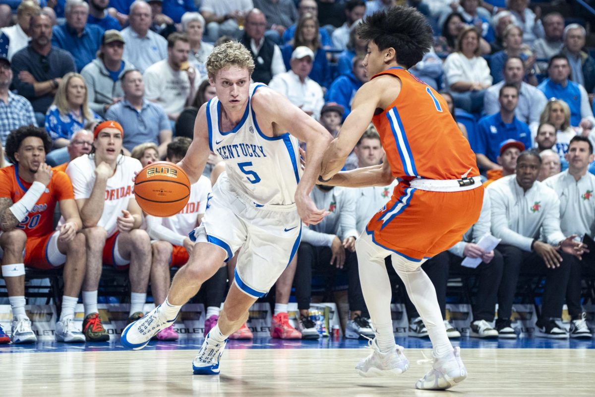 Kentucky guard Collin Chandler drives past Florida guard Xavian Lee during the men’s basketball game against Florida on Saturday, March 7, 2026, at Rupp Arena in Lexington, Ky. Photo by Will Luckett | Kentucky Kernel