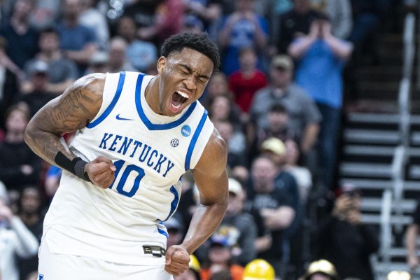 Kentucky forward Brandon Garrison celebrates as Kentucky takes the lead in overtime during the NCAA men's basketball tournament game against Santa Clara on Friday, March 20, 2026, at Enterprise Center in St. Louis, Mo. Kentucky won 89-84 in overtime. Photo by Will Luckett | Kentucky Kernel
